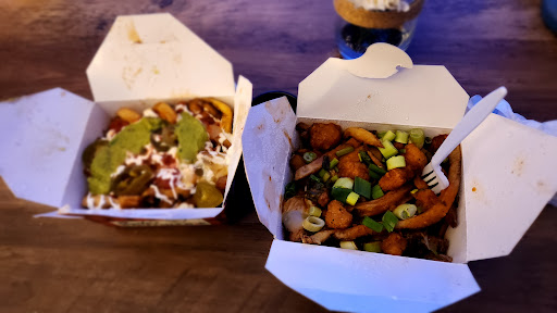 Photo of Smoke's Poutinerie St. John's - 165 Water St, St. John's, NL A1C 1A8